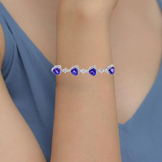 Elegant Tanzanite Trillion & Diamond Bracelet in 18k Gold