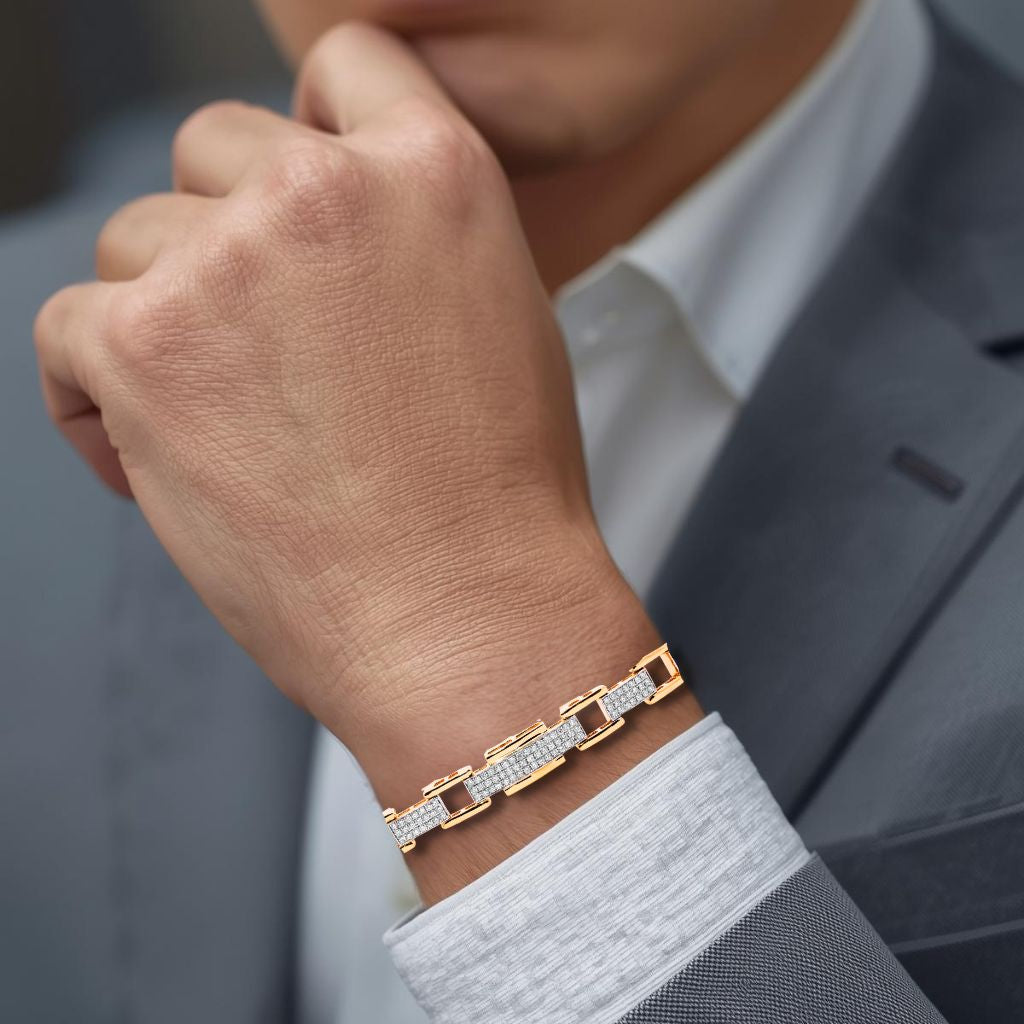 Diamond & Gold bracelet on a man's wrist with a blurred background