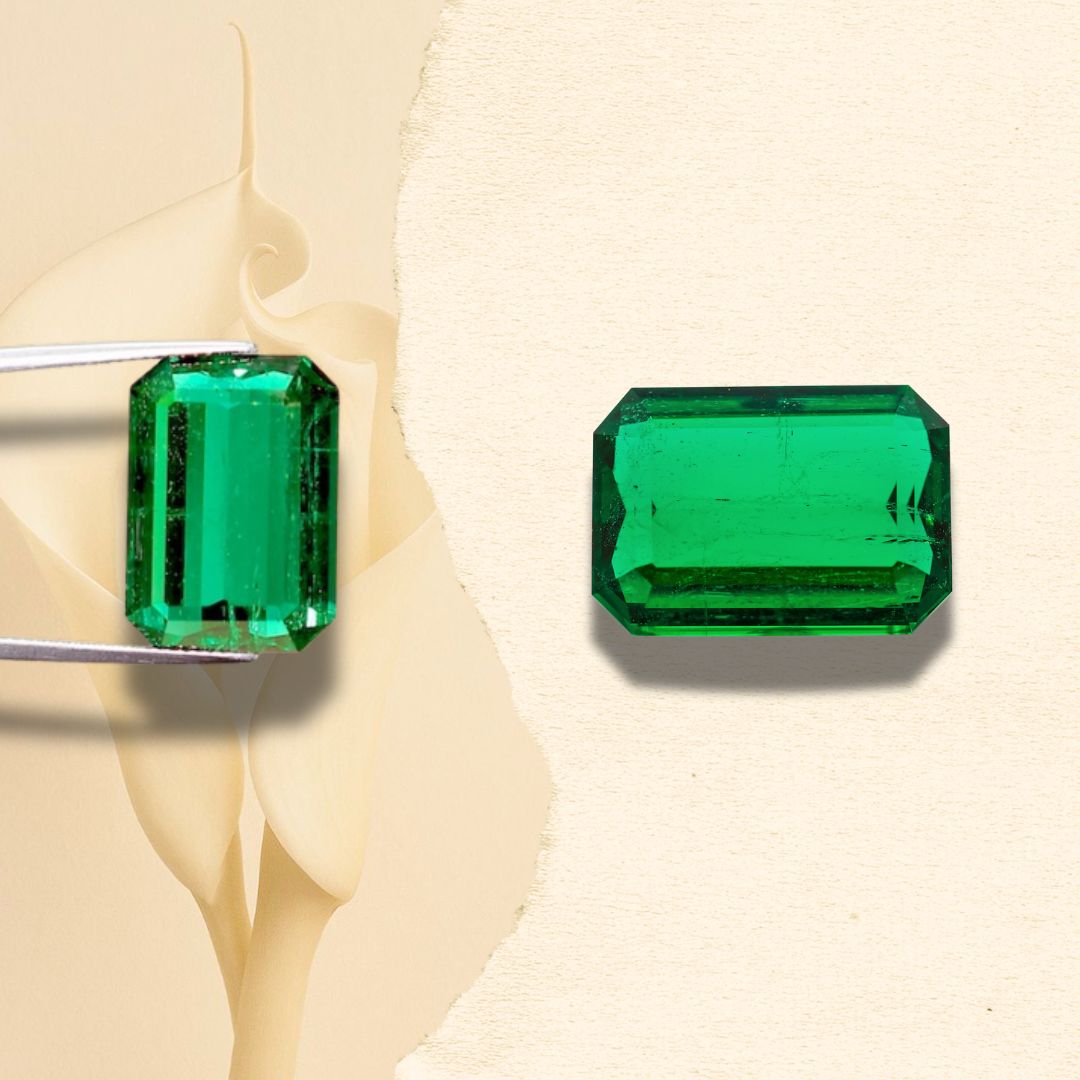 No oil emerald gemstones on a beige background